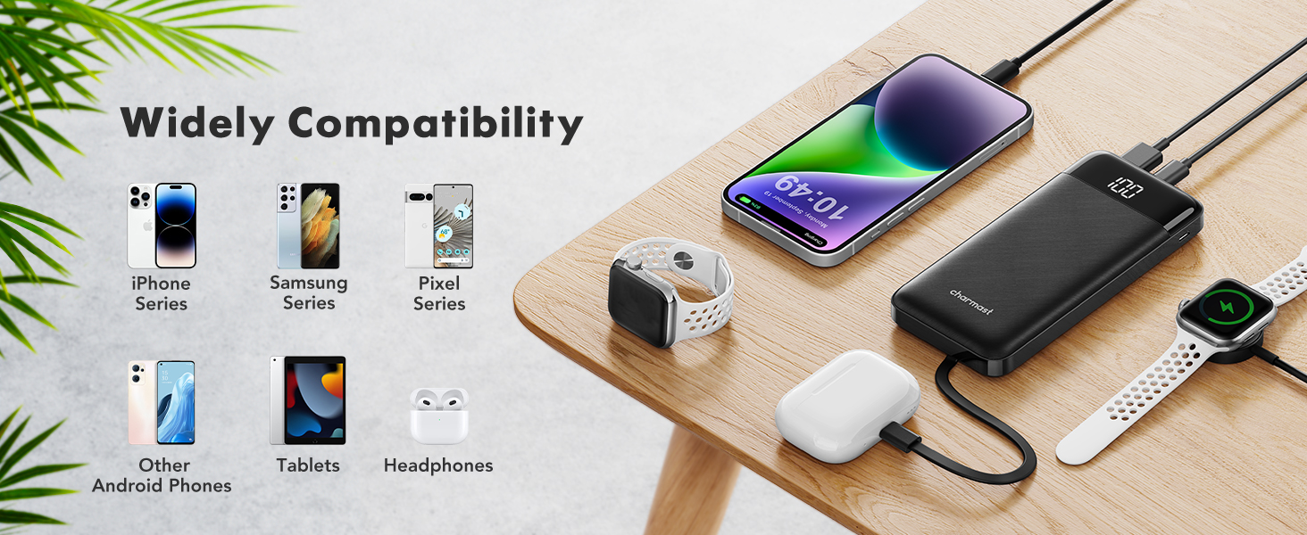 a table with a variety of gadgets on it