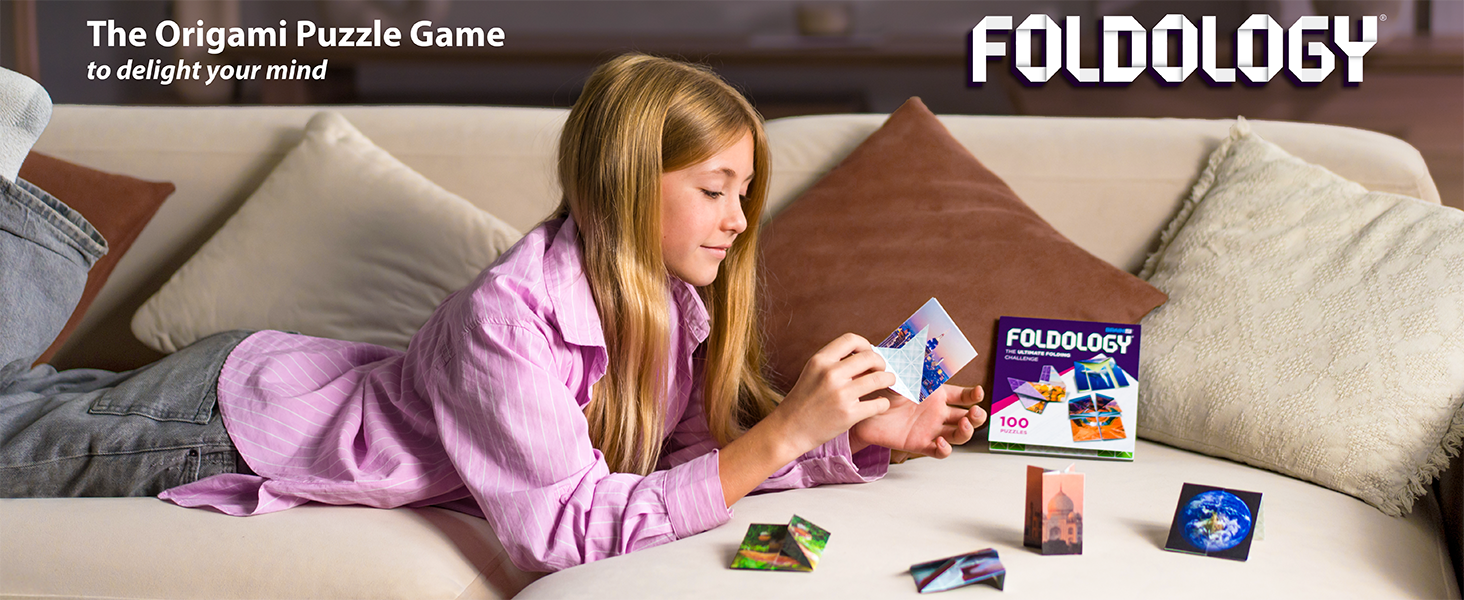 girl on couch playing foldology