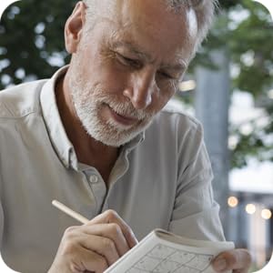 man playing sudoku